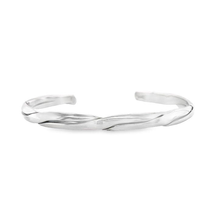 photo of a silver cuff on a white background