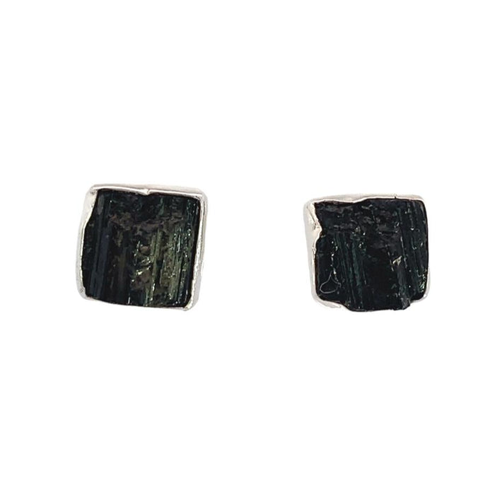 photo of a pair of silver square raw black tourmaline stud earrings on a white background