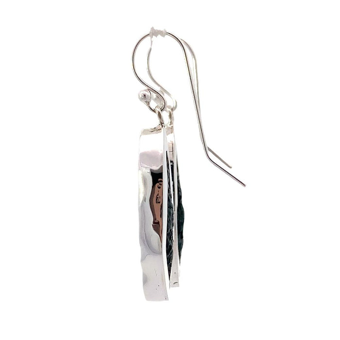 photo of long silver geode earrings on a white background ,side view