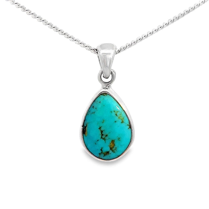 photo of a silver pear shape bezel set turquoise pendant and chain on a white background