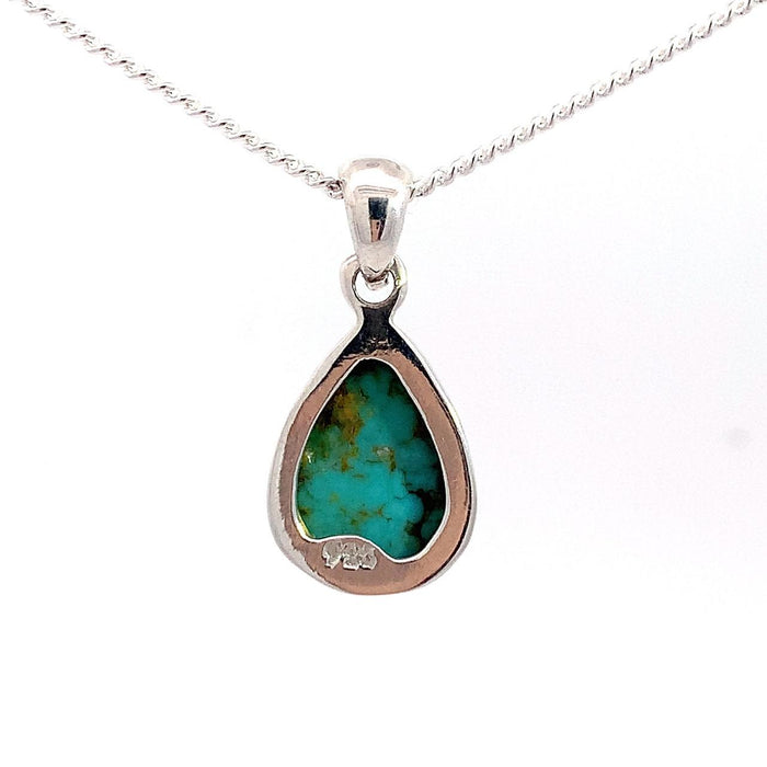 photo of a silver pear shape bezel set turquoise pendant and chain on a white background rear view