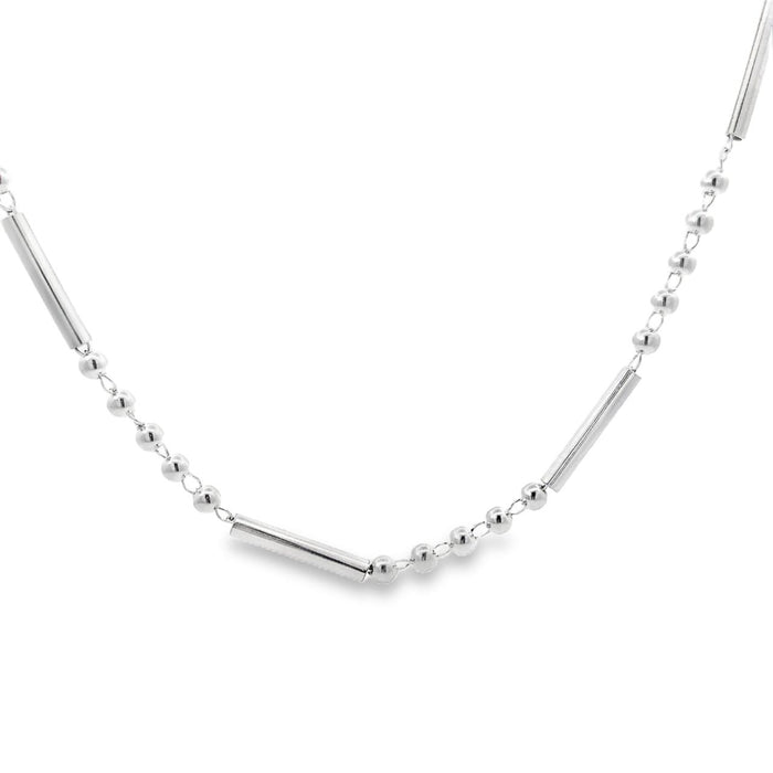 photo of a silver ball and bar link chain on a white background