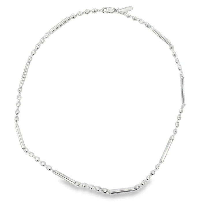 photo of a silver ball and bar link chain on a white background