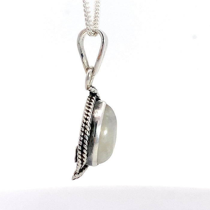 Taxco sterling silver pear shape white cabochon moonstone pendant with rope frame and double ridge bail side view