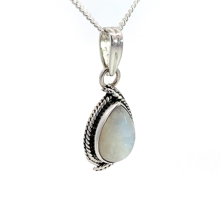 Taxco sterling silver pear shape white cabochon moonstone pendant with rope frame and double ridge bail