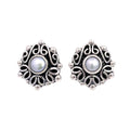 Taxco artisan sterling silver pearl stud earrings bezel set pearl with raised scrollwork frame handcrafted Mexican silver jewelry