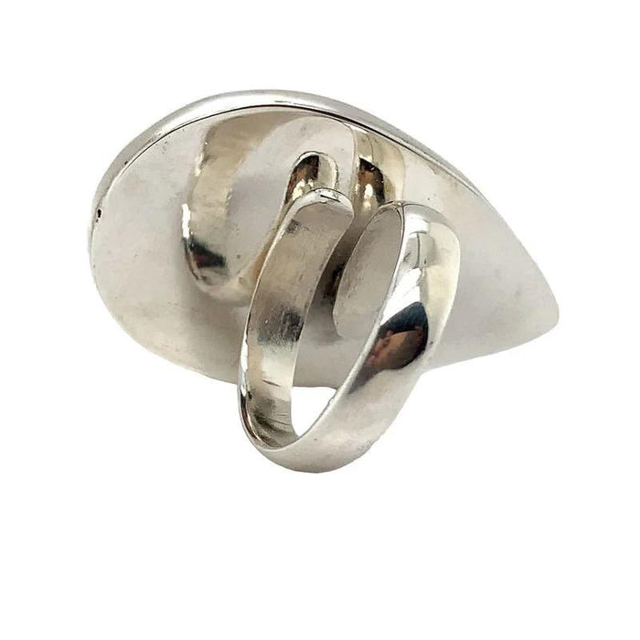 photo of a large pear shape obsidian sterling silver ring on a white background