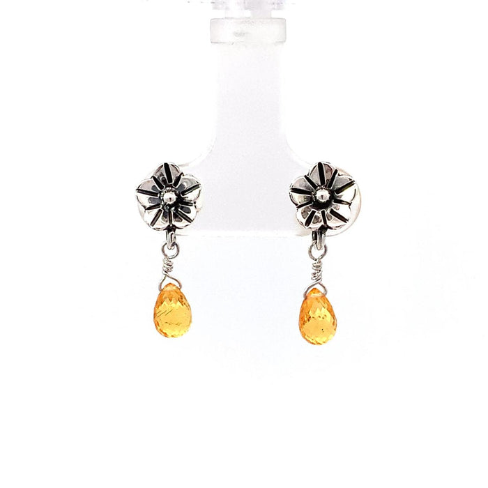 photo of a silver earring-handmade floral top and dangle natural yellow sapphire briolette on a white background
