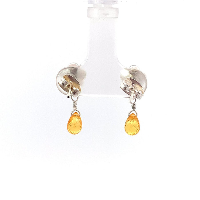 photo of a silver earring-handmade floral top and dangle natural yellow sapphire briolette on a white background back view