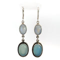 photo of  a 2-part dangle silver earring with oval moonstone and oval blue chalcedony on a white background