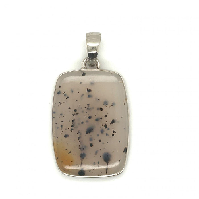 photo of a sterling silver set rectangular agate pendant on a white background