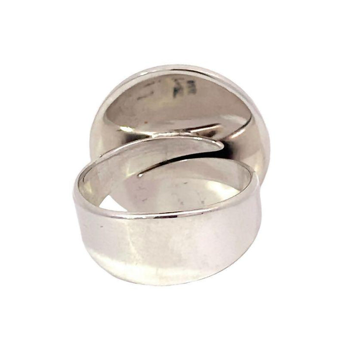 photo of a silver round cabochon Turquoise ring on a white background rear view