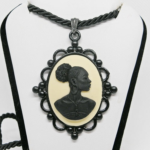 Cameo necklace with a profile of a woman on a white background