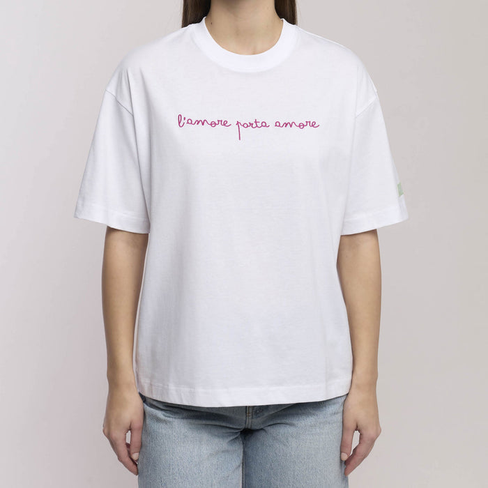 Maglia oversize donna con la frase "L'amore porta amore"