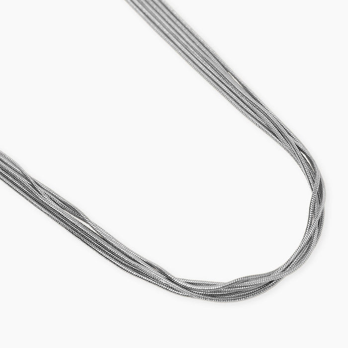 Girocollo in acciaio argentato con catene snake