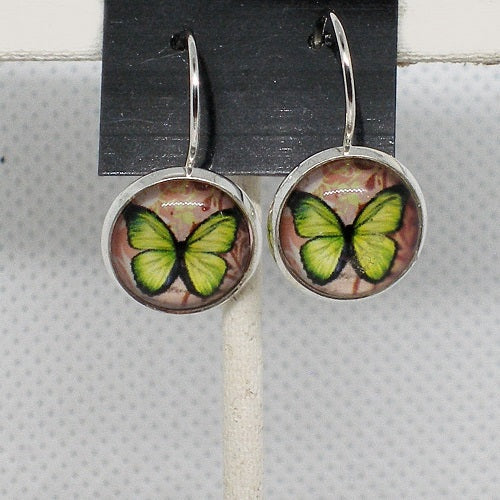 Butterfly-themed earrings on a gray background